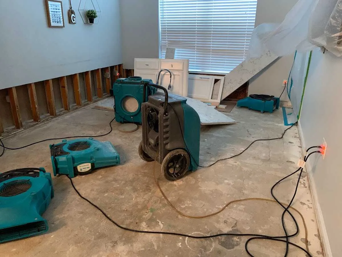 Dehumidifier in flood-cut room for Water Damage Restoration in Warr Acres